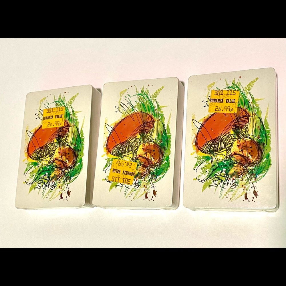 Three vintage decks of playing cards. New and sealed